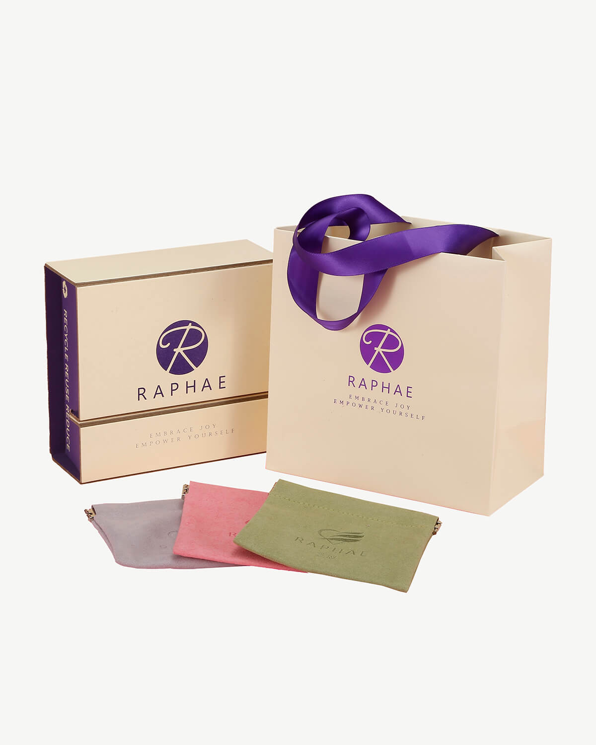 a paper bag with a purple ribbon around it